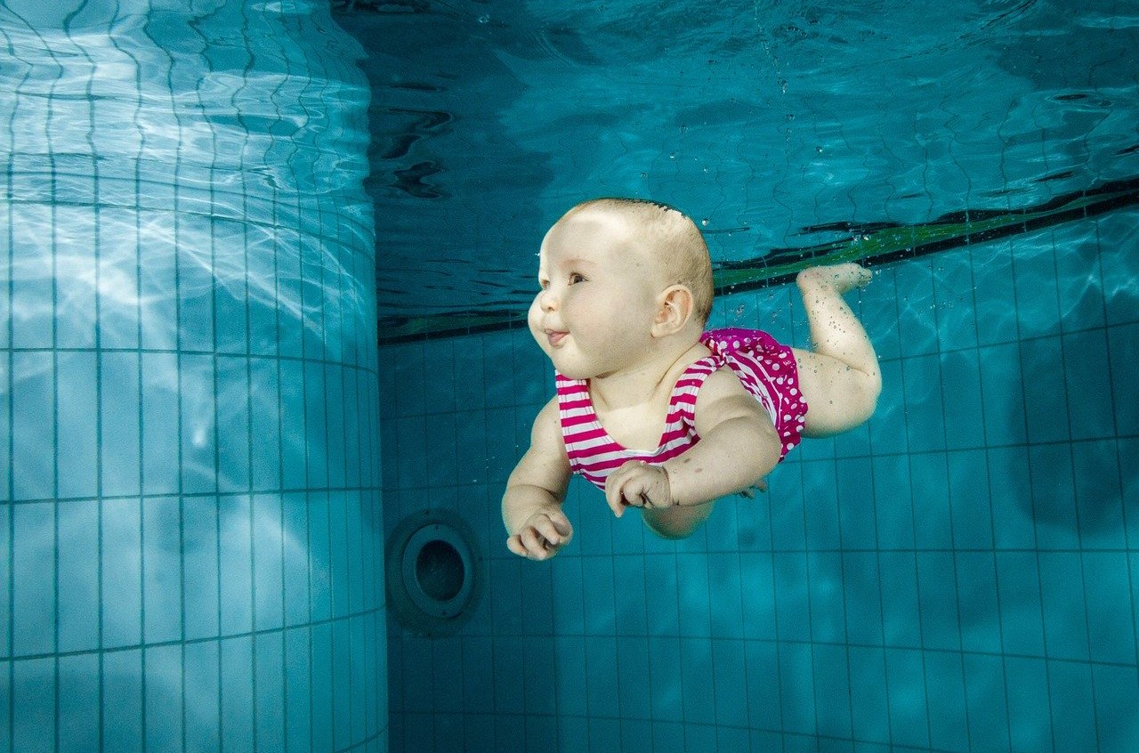 Swimming infant baby