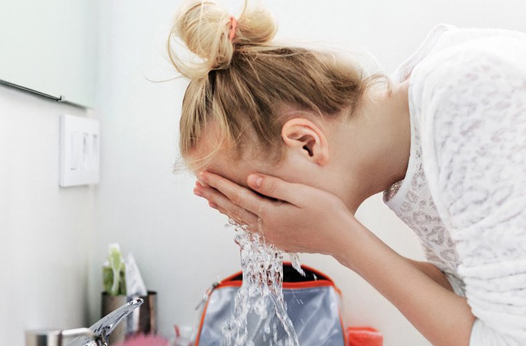 Girl Washing Face