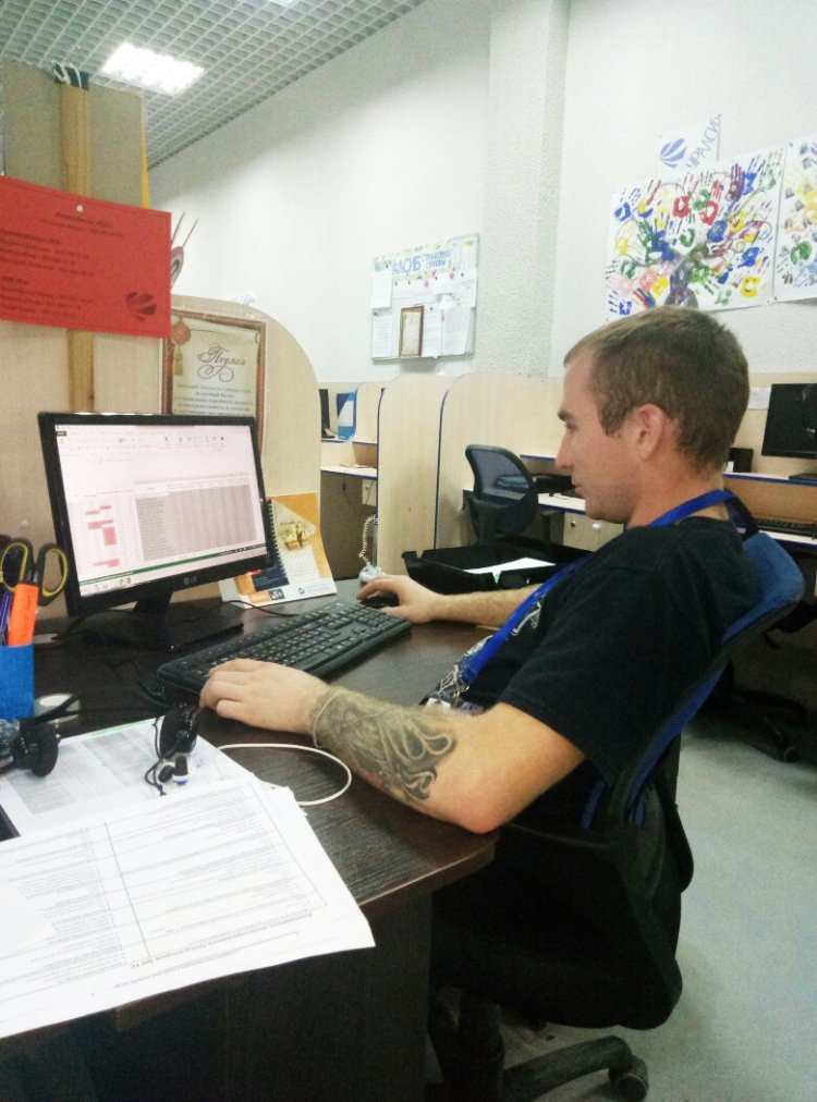 Aleхey Litvintsev in front of computer